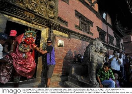 June 4, 2016 - Kathmandu, NP, Nepal - Saroj Mali (L), 22yrs, impersonate as deity Indrayani arriver to perform religious ritual dance during 12 year Shree Bagh Bhairab Dance Jatra Celebrated at Patan, Nepal on June 4, 2016. Which is celebrated once every 12 years in different places of Kirtipur, Kathmandu and Patan. It is known as Barha Barse Shree Bagh Bhairab Jatra in local Nepali language. Kathmandu Nepal  - ZUMAn230