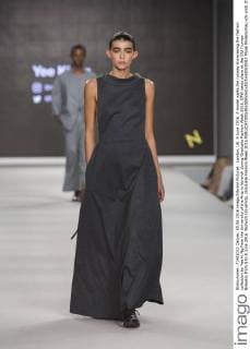 London, UK. 5 June 2016. A model walks the runway showcasing the fashion collection by Yee Ki Ng from the University of the Arts in Norwich during Graduate Fashion Week 2016. GFW takes place at the Old Truman Brewery from 5 to 8 June 2016. Norwich University, Graduate Fashion Week 2016 