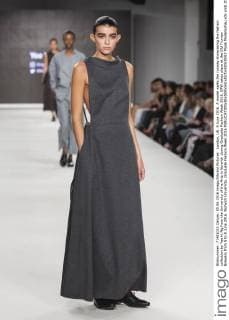 London, UK. 5 June 2016. A model walks the runway showcasing the fashion collection by Yee Ki Ng from the University of the Arts in Norwich during Graduate Fashion Week 2016. GFW takes place at the Old Truman Brewery from 5 to 8 June 2016. Norwich University, Graduate Fashion Week 2016 