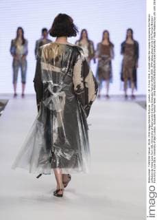 London, UK. 5 June 2016. A model walks the runway showcasing the fashion collection by Katie Lane from UEL (University of East London) during Graduate Fashion Week 2016. GFW takes place at the Old Truman Brewery from 5 to 8 June 2016. University of East London, Graduate Fashion Week 2016 