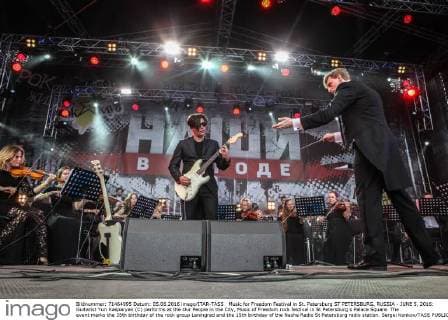 Music for Freedom Festival in St. Petersburg ST PETERSBURG, RUSSIA - JUNE 5, 2016: Guitarist Yuri Kasparyan (C) performs at the Our People in the City, Music of Freedom rock festival in St Petersburg s Palace Square. The event marks the 35th birthday of the rock group Leningrad and the 15th birthday of the Nashe Radio St Petersburg radio station. Sergei Konkov TASS  TS025985