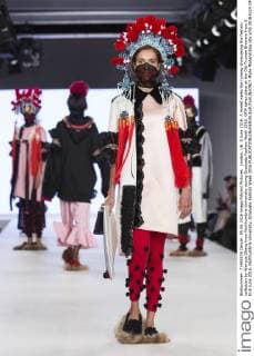 London, UK. 5 June 2016. A model walks the runway showcasing the fashion collection by Wenyue Zhang from Northumbria University during Graduate Fashion Week 2016. GFW takes place at the Old Truman Brewery from 5 to 8 June 2016. Northumbria University, Graduate Fashion Week 2016 