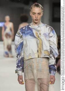 London, UK. 6 June 2016. A model walks the runway showcasing the fashion collection by Rebecca Jenkins from the University of the Arts at Bournemouth during Graduate Fashion Week 2016. GFW takes place at the Old Truman Brewery from 5 to 8 June 2016. Bournemouth, Graduate Fashion Week 2016 
