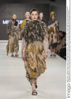 London, UK. 6 June 2016. A model walks the runway showcasing the fashion collection by Millie Turner from the University of the Arts at Bournemouth during Graduate Fashion Week 2016. GFW takes place at the Old Truman Brewery from 5 to 8 June 2016. Bournemouth, Graduate Fashion Week 2016 
