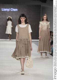 London, UK. 6 June 2016. A model walks the runway showcasing the fashion collection by Lianyi Chen from Nottingham Trent University during Graduate Fashion Week 2016. GFW takes place at the Old Truman Brewery from 5 to 8 June 2016. Nottingham Trent University, Graduate Fashion Week 2016 