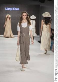 London, UK. 6 June 2016. A model walks the runway showcasing the fashion collection by Lianyi Chen from Nottingham Trent University during Graduate Fashion Week 2016. GFW takes place at the Old Truman Brewery from 5 to 8 June 2016. Nottingham Trent University, Graduate Fashion Week 2016 