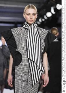 London, UK. 6 June 2016. A model walks the runway showcasing the fashion collection by Tanya Mathews from UCA Epsom during Graduate Fashion Week 2016. GFW takes place at the Old Truman Brewery from 5 to 8 June 2016. UCA Epsom, Graduate Fashion Week 2016 