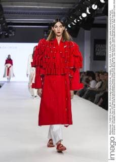 London, UK. 6 June 2016. A model walks the runway showcasing the fashion collection by Lisa Crook from UCA Epsom during Graduate Fashion Week 2016. GFW takes place at the Old Truman Brewery from 5 to 8 June 2016. UCA Epsom, Graduate Fashion Week 2016 