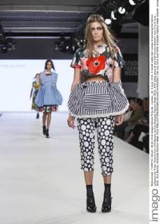 London, UK. 6 June 2016. A model walks the runway showcasing the fashion collection by Vivien Akwero from UCA Epsom during Graduate Fashion Week 2016. GFW takes place at the Old Truman Brewery from 5 to 8 June 2016. UCA Epsom, Graduate Fashion Week 2016 
