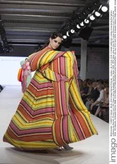 London, UK. 6 June 2016. A model walks the runway showcasing the fashion collection by Ramlah Wraich from UCA Epsom during Graduate Fashion Week 2016. GFW takes place at the Old Truman Brewery from 5 to 8 June 2016. UCA Epsom, Graduate Fashion Week 2016 