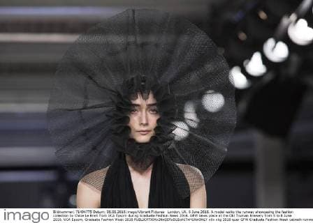 London, UK. 6 June 2016. A model walks the runway showcasing the fashion collection by Chloe Le Brett from UCA Epsom during Graduate Fashion Week 2016. GFW takes place at the Old Truman Brewery from 5 to 8 June 2016. UCA Epsom, Graduate Fashion Week 2016 