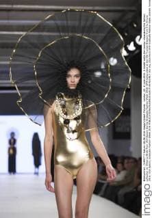 London, UK. 6 June 2016. A model walks the runway showcasing the fashion collection by Chloe Le Brett from UCA Epsom during Graduate Fashion Week 2016. GFW takes place at the Old Truman Brewery from 5 to 8 June 2016. UCA Epsom, Graduate Fashion Week 2016 