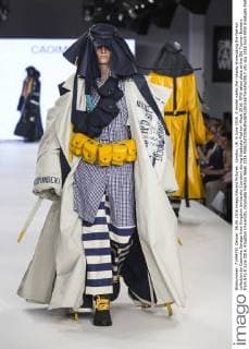 London, UK. 6 June 2016. A model walks the runway showcasing the fashion collection by Caoimhe Savage from Kingston University (London) during Graduate Fashion Week 2016. GFW takes place at the Old Truman Brewery from 5 to 8 June 2016. Kingston University, Graduate Fashion Week 2016 