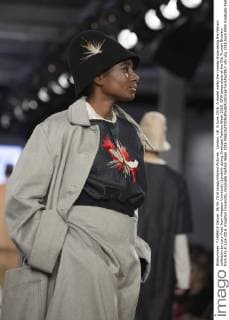London, UK. 6 June 2016. A model walks the runway showcasing the fashion collection by Lucy Frost from Kingston University (London) during Graduate Fashion Week 2016. GFW takes place at the Old Truman Brewery from 5 to 8 June 2016. Kingston University, Graduate Fashion Week 2016 