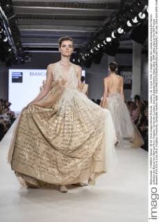 London, UK. 6 June 2016. A model walks the runway showcasing the fashion collection by Bianca Von Stempel from Kingston University (London) during Graduate Fashion Week 2016. GFW takes place at the Old Truman Brewery from 5 to 8 June 2016. Kingston University, Graduate Fashion Week 2016 