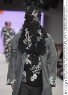 London, UK. 8 June 2016. A model walks the runway showcasing the fashion collection by George Hollins from Arts University Bournemouth during The Best of Graduate Fashion Week 2016 show. GFW takes place at the Old Truman Brewery from 5 to 8 June 2016. Best of Graduate Fashion Week 2016, London, UK 