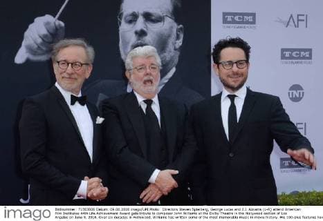 Directors Steven Spielberg, George Lucas and J.J. Abrams (L-R) attend American Film Institutes 44th Life Achievement Award gala tribute to composer John Williams at the Dolby Theatre in the Hollywood section of Los Angeles on June 9, 2016. Over six decades in Hollywood, Williams has written some of the most memorable music in movie history. His 100-plus features have earned 50 Academy Award nominations (making him the most-nominated living person), winning five times. Williams also received 22 Grammys, seven BAFTAs, five Emmys, four Golden Globes, a Kennedy Center Honor and the National Medal of Arts. And then there are all those iconic themes, the ones everyone in the world knows.  LAP2016060912 JIMxRUYMEN