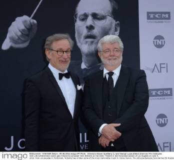 Directors Steven Spielberg (L) and George Lucas attend American Film Institutes 44th Life Achievement Award gala tribute to composer John Williams at the Dolby Theatre in the Hollywood section of Los Angeles on June 9, 2016. Over six decades in Hollywood, Williams has written some of the most memorable music in movie history. His 100-plus features have earned 50 Academy Award nominations (making him the most-nominated living person), winning five times. Williams also received 22 Grammys, seven BAFTAs, five Emmys, four Golden Globes, a Kennedy Center Honor and the National Medal of Arts. And then there are all those iconic themes, the ones everyone in the world knows.  LAP2016060915 JIMxRUYMEN