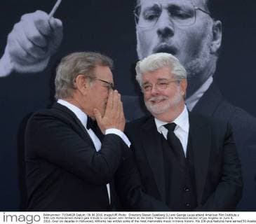 Directors Steven Spielberg (L) and George Lucas attend American Film Institute s 44th Life Achievement Award gala tribute to composer John Williams at the Dolby Theatre in the Hollywood section of Los Angeles on June 9, 2016. Over six decades in Hollywood, Williams has written some of the most memorable music in movie history. His 100-plus features have earned 50 Academy Award nominations (making him the most-nominated living person), winning five times. Williams also received 22 Grammys, seven BAFTAs, five Emmys, four Golden Globes, a Kennedy Center Honor and the National Medal of Arts. And then there are all those iconic themes, the ones everyone in the world knows.  LAP2016060931 JIMxRUYMEN