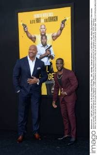 Cast member Dwayne Johnson (L) and Kevin Hart attend the premiere of the motion picture comedy Central Intelligence at the Regency Village Theatre in the Westwood section of Los Angeles on June 10, 2016. Storyline: After he reunites with an old pal through Facebook, a mild-mannered accountant is lured into the world of international espionage.  LAP2016061001 JIMxRUYMEN