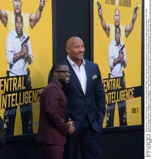 Cast member Dwayne Johnson (L) and Kevin Hart attend the premiere of the motion picture comedy Central Intelligence at the Regency Village Theatre in the Westwood section of Los Angeles on June 10, 2016. Storyline: After he reunites with an old pal through Facebook, a mild-mannered accountant is lured into the world of international espionage.  LAP2016061003 JIMxRUYMEN
