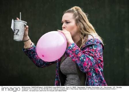 June 11, 2016 - Manchester, Greater Manchester, UK - Manchester , UK . Reveller breathing from a balloon at the Parklife music festival at Heaton Park in Manchester Manchester UK  - ZUMAl94_