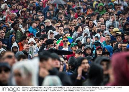 June 11, 2016 - Manchester, Greater Manchester, UK - Manchester , UK . England fans watch the England vs Russia match on a big screen at Parklife music festival at Heaton Park in Manchester Manchester UK  - ZUMAl94_