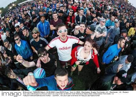 June 11, 2016 - Manchester, Greater Manchester, UK - Manchester , UK . England fans watch the England vs Russia match on a big screen at Parklife music festival at Heaton Park in Manchester Manchester UK  - ZUMAl94_