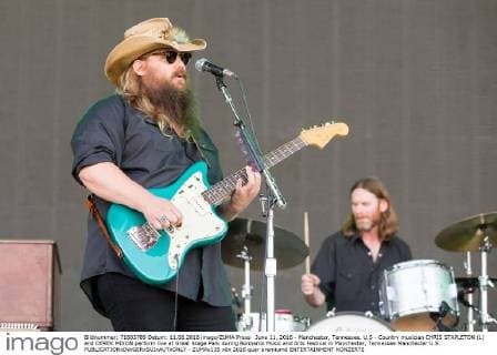 June 11, 2016 - Manchester, Tennessee, U.S - Country musician CHRIS STAPLETON (L) and DEREK MIXON perform live at Great Stage Park during Bonnaroo Music and Arts Festival in Manchester, Tennessee Manchester U.S. - ZUMAs135