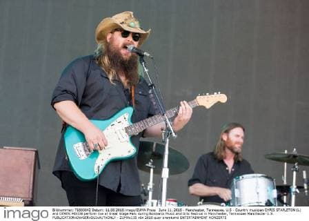 June 11, 2016 - Manchester, Tennessee, U.S - Country musician CHRIS STAPLETON (L) and DEREK MIXON perform live at Great Stage Park during Bonnaroo Music and Arts Festival in Manchester, Tennessee Manchester U.S. - ZUMAs135