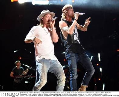 June 11, 2016 - Nashville, Tennessee, United States - 11 June 2016 - Nashville, Tennessee - Tyler Hubbard and Brian Kelley, Florida Georgia Line. 2016 CMA Music Festival Nightly Concert held at Nissan Stadium. Photo Credit: Laura Farr AdMedia Nashville United States - ZUMAa123