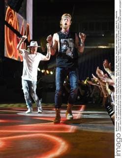 June 11, 2016 - Nashville, Tennessee, United States - 11 June 2016 - Nashville, Tennessee - Tyler Hubbard and Brian Kelley, Florida Georgia Line. 2016 CMA Music Festival Nightly Concert held at Nissan Stadium. Photo Credit: Laura Farr AdMedia Nashville United States - ZUMAa123