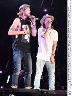 June 11, 2016 - Nashville, Tennessee, United States - 11 June 2016 - Nashville, Tennessee - Tyler Hubbard and Brian Kelley, Florida Georgia Line. 2016 CMA Music Festival Nightly Concert held at Nissan Stadium. Photo Credit: Laura Farr AdMedia Nashville United States - ZUMAa123