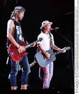 June 11, 2016 - Nashville, Tennessee, United States - 11 June 2016 - Nashville, Tennessee - Tyler Hubbard and Brian Kelley, Florida Georgia Line. 2016 CMA Music Festival Nightly Concert held at Nissan Stadium. Photo Credit: Laura Farr AdMedia Nashville United States - ZUMAa123