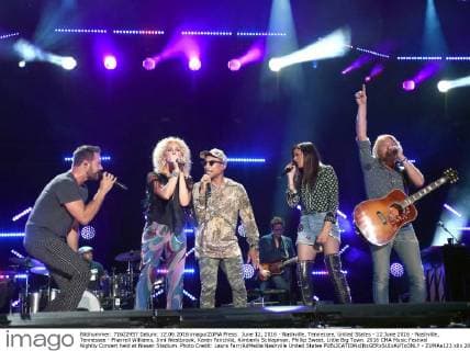 June 12, 2016 - Nashville, Tennessee, United States - 12 June 2016 - Nashville, Tennessee - Pharrell Williams, Jimi Westbrook, Karen Fairchild, Kimberly Schlapman, Phillip Sweet, Little Big Town. 2016 CMA Music Festival Nightly Concert held at Nissan Stadium. Photo Credit: Laura Farr AdMedia Nashville United States - ZUMAa123