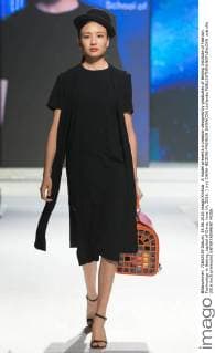 A model presents a creation designed by graduates of Beijing Institute of Fashion Technology in Beijing, capital of China, June 14, 2016. ) (ry) CHINA-BEIJING-FASHION SHOW(CN) LixJianbo 