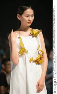 A model presents a creation designed by graduates of Beijing Institute of Fashion Technology in Beijing, capital of China, June 14, 2016. ) (ry) CHINA-BEIJING-FASHION SHOW(CN) LixJianbo 