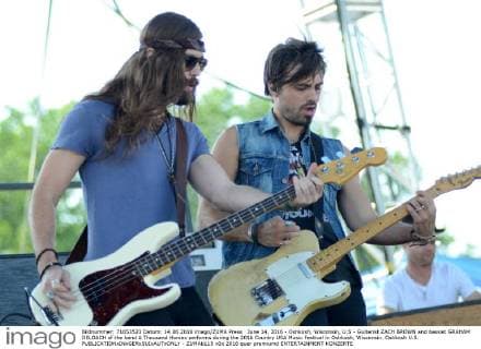 June 14, 2016 - Oshkosh, Wisconsin, U.S - Guitarist ZACH BROWN and bassist GRAHAM DELOACH of the band A Thousand Horses performs during the 2016 Country USA Music Festival in Oshkosh, Wisconsin. Oshkosh U.S. - ZUMAb115