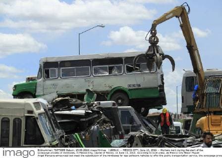 (160616) -- MEXICO CITY, June 16, 2016 -- Workers work during the start of the scrappage process of minibuses, in Mexico City, capital of Mexico, on June 15, 2016. According to local press, as Mexico City Mayor Miguel Angel Mancera announced last week the substitution of the minibuses for less pollutant vehicles to offer the public transportation service, the scrappage process began on Wednesday. Str) (da) (fnc) MEXICO-MEXICO CITY-TRANSPORTATION-SCRAPPAGE e STR 