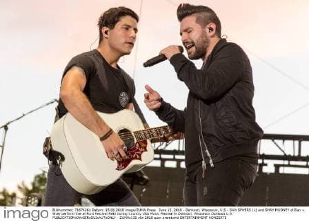 June 15, 2016 - Oshkosh, Wisconsin, U.S - DAN SMYERS (L) and SHAY MOONEY of Dan + Shay perform live at Ford Festival Field during Country USA Music Festival in Oshkosh, Wisconsin Oshkosh U.S. - ZUMAs135