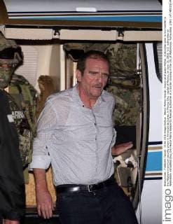 Hector Palma Salazar, known as el guero Palma , is escorted prior to his transfer to the Altiplano maximum security prison in Almoloya de Juarez, in Mexico City, capital of Mexico, on June 15, 2016. U.S. authorities on Wednesday extradited drug lord Hector Palma Salazar to Mexican authorities at a border crossing in the city of Matamoros, Tamaulipas. ( Str) (vf) MEXICO-MEXICO CITY-SECURITY-DRUG TRAFFICKING Xinhua 