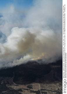 June 16, 2016 - U.S. - The Dog Head Fire as seen from the Black Hawk helicopter that flew New Mexico Governor Susana Martinez over the fire, Thursday June 16, 2016. U.S. - ZUMAab1_