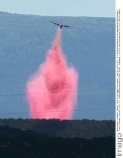 June 16, 2016 - U.S. - -- A fire fighting tanker drops retardant on the Dog Head Fire on Thursday, June 16, 2016. U.S. - ZUMAab1_