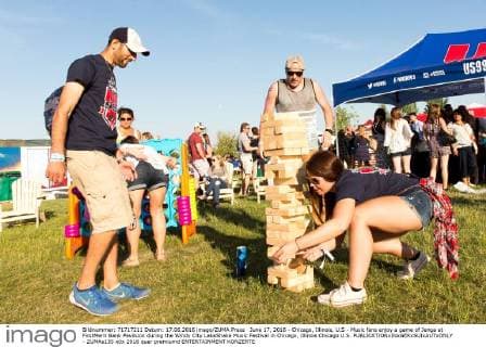 June 17, 2016 - Chicago, Illinois, U.S - Music fans enjoy a game of Jenga at FirstMerit Bank Pavilsion during the Windy City LakeShake Music Festival in Chicago, Illinois Chicago U.S. - ZUMAs135