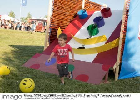 June 17, 2016 - Chicago, Illinois, U.S - A young music fan enjoys the grounds at FirstMerit Bank Pavilsion during the Windy City LakeShake Music Festival in Chicago, Illinois Chicago U.S. - ZUMAs135