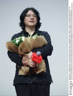 SHANGHAI, CHINA - JUNE 17: (CHINA OUT) Japanese director Shunji Iwai attends fan meeting after premiere of his new movie A Bride for Rip Van Winkle during the 19th Shanghai International Film Festival on June 17, 2016 in Shanghai, China.  CFP486653339