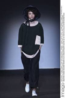 (160618) -- MILAN, June 18, 2016 -- A model presents a creation for MIAORAN men s Spring-Summer 2016-2017 collection, part of the Milan Fashion Week in Milan, Italy, on June 18, 2016. ) ITALY-MILAN-FASHION WEEK-MEN-CHINESE DESIGNER-MIAORAN JinxYu 