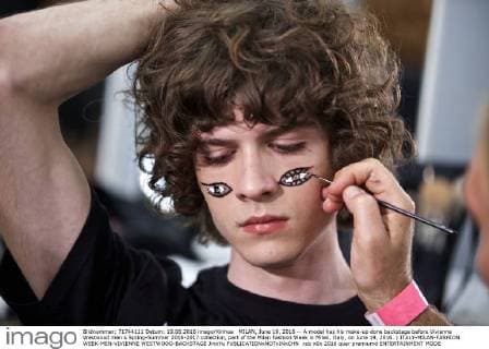 MILAN, June 19, 2016 -- A model has his make-up done backstage before Vivienne Westwood men s Spring-Summer 2016-2017 collection, part of the Milan Fashion Week in Milan, Italy, on June 19, 2016. ) ITALY-MILAN-FASHION WEEK-MEN-VIVIENNE WESTWOOD-BACKSTAGE JinxYu 