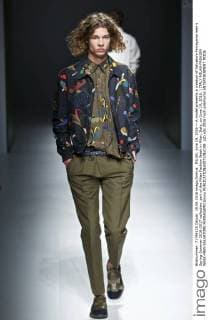 MILAN, June 19, 2016 -- A model presents a creation of Salvatore Ferragamo men s Spring-Summer 2016-2017 collection, part of the Milan Fashion Week in Milan, Italy, on June 19, 2016. ) ITALY-MILAN-FASHION WEEK-MEN-SALVATORE FERRAGAMO jinxyu 