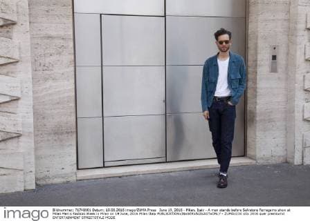 June 19, 2016 - Milan, Italy - A man stands before Salvatore Ferragamo show at Milan Men s Fashion Week in Milan on 19 June, 2016 Milan Italy  - ZUMAn230